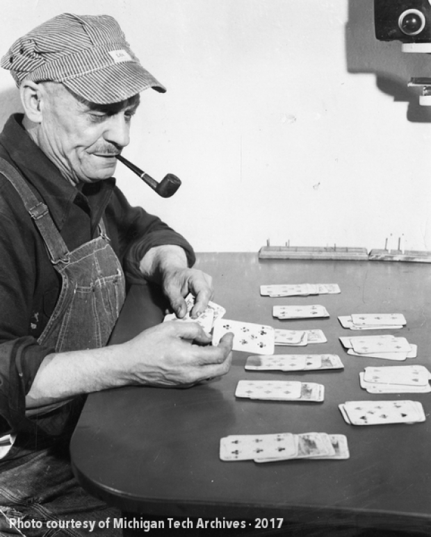 Man playing solitaire